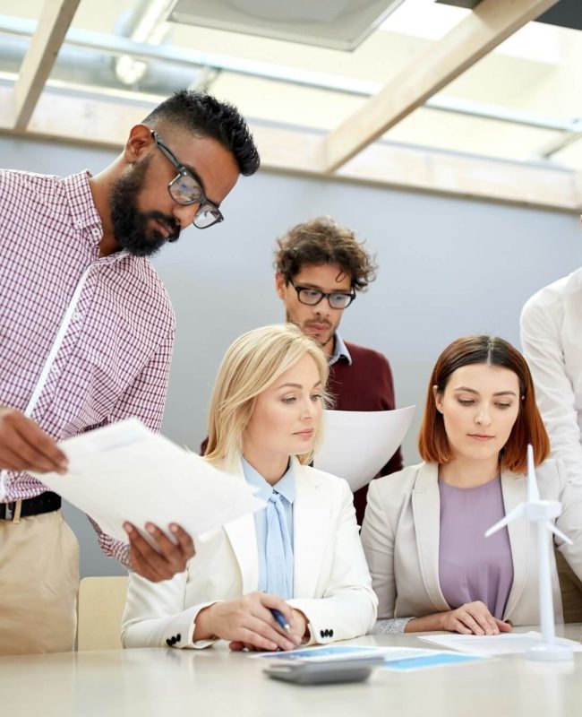 business-people-discussing-green-energy-project.jpg